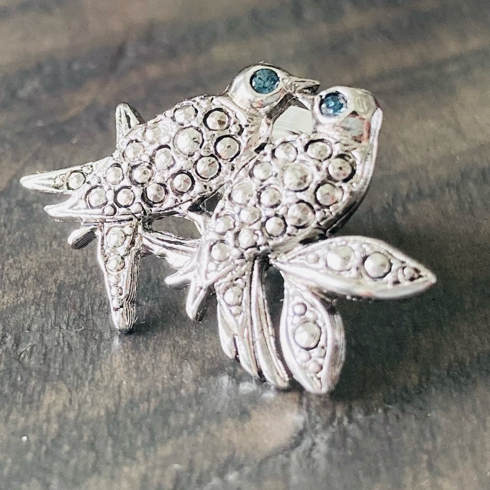 Vintage two birds on tree branch pin.